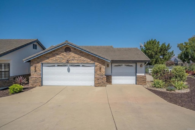 single story home with a garage