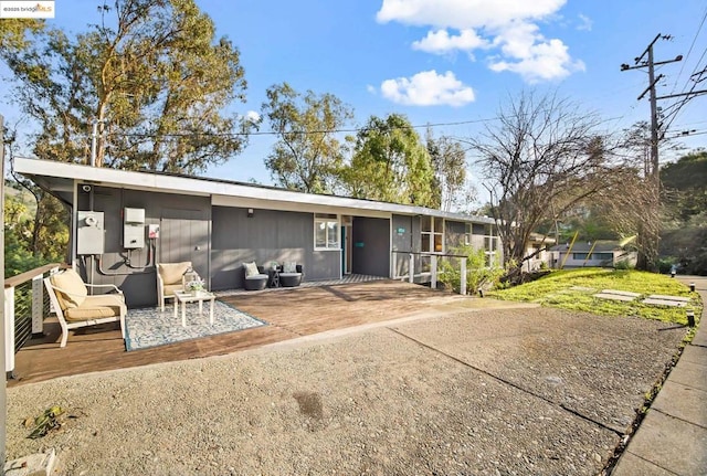 back of house with a sunroom