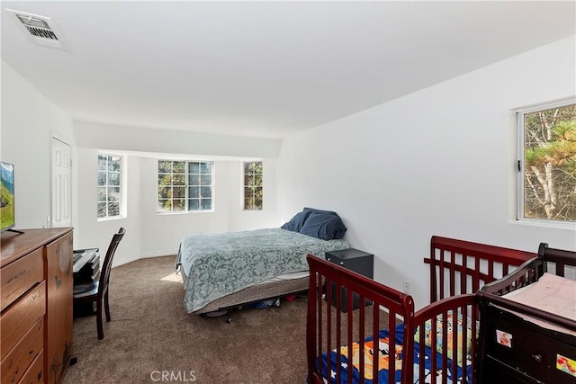 bedroom featuring carpet