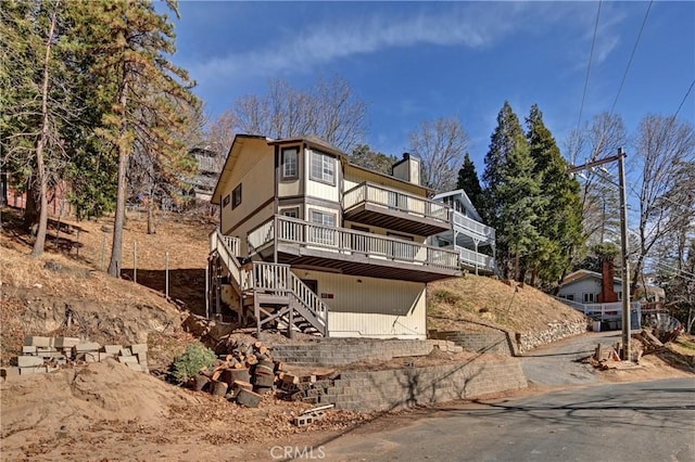 view of front of property with a deck