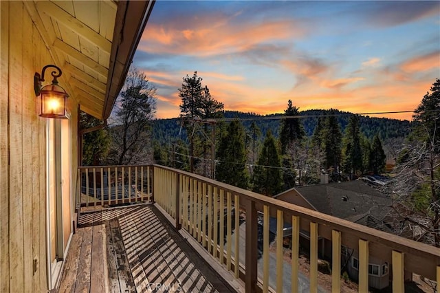 view of balcony at dusk