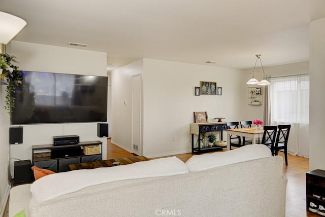 living room featuring light wood-type flooring