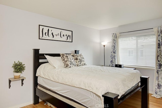 bedroom featuring light hardwood / wood-style flooring