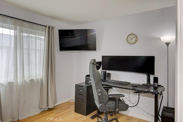 home office with light wood-type flooring