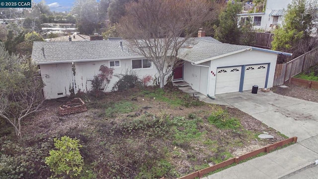 single story home featuring a garage