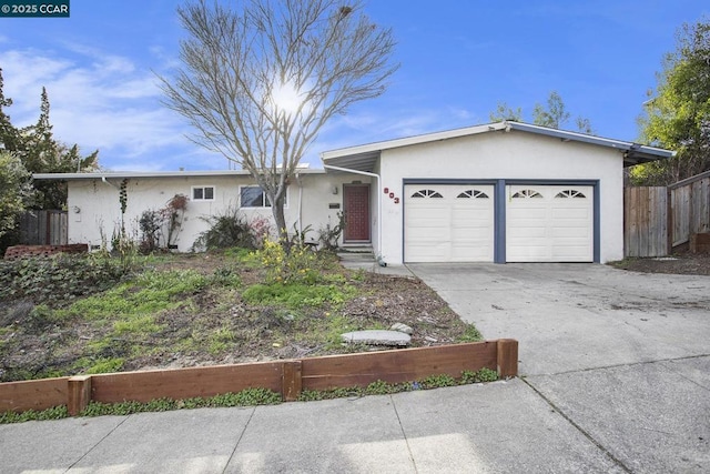 single story home with a garage