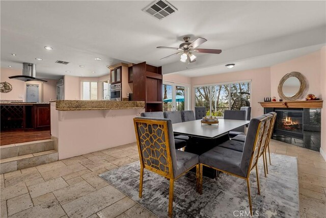 dining area with ceiling fan