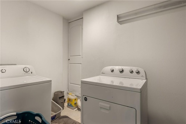 laundry area with washer and dryer