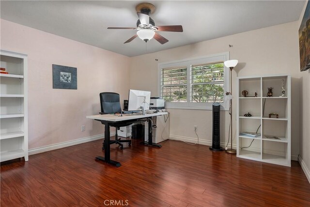 home office featuring ceiling fan and dark hardwood / wood-style floors