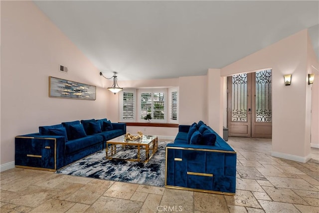 living room with lofted ceiling