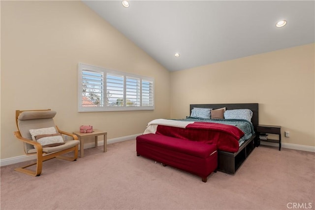 carpeted bedroom featuring high vaulted ceiling