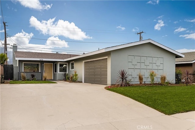 ranch-style house with a garage and a front yard