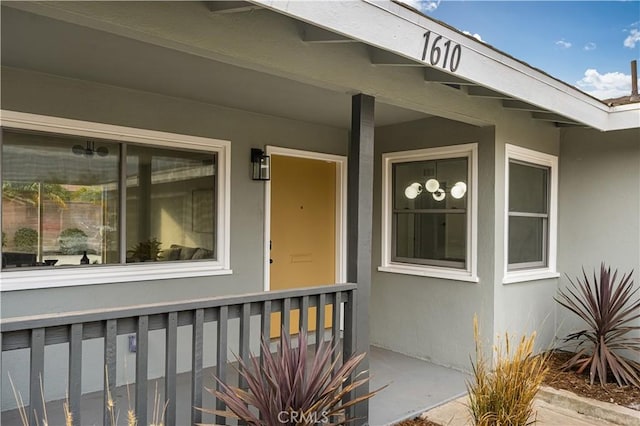 property entrance with a porch