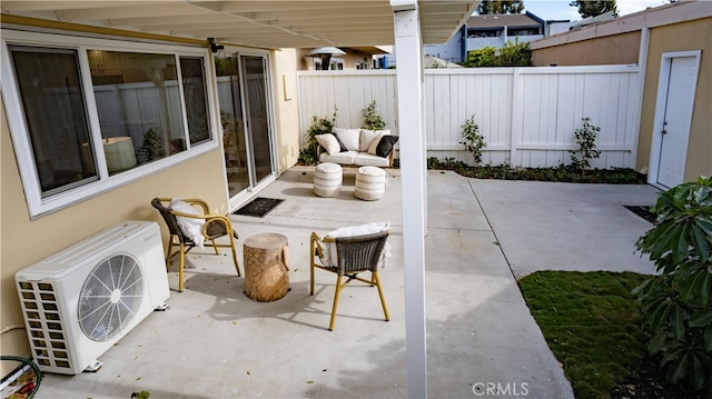 view of patio featuring ac unit