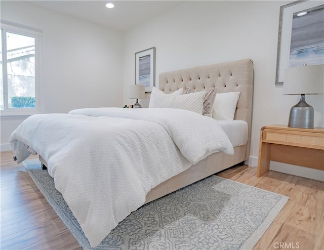 bedroom featuring light hardwood / wood-style flooring