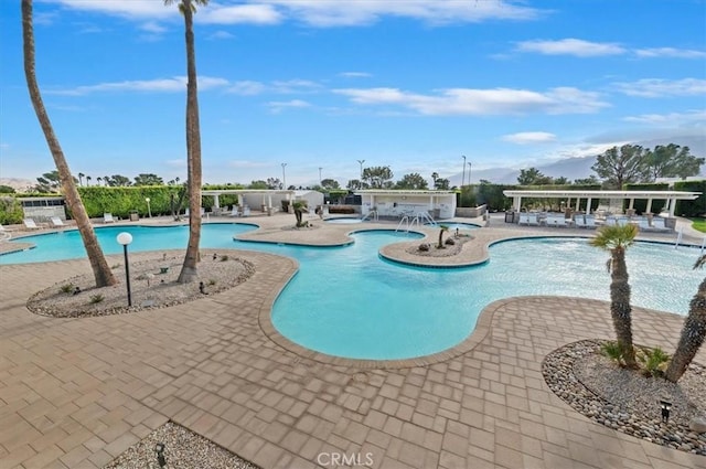 pool with a patio