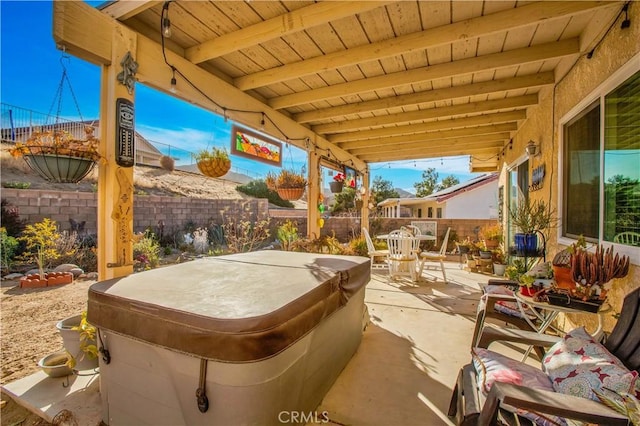 view of patio featuring a hot tub