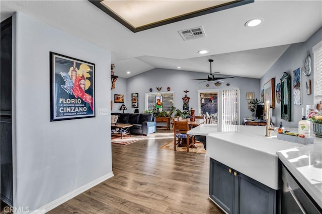 kitchen featuring lofted ceiling, ceiling fan, and hardwood / wood-style flooring