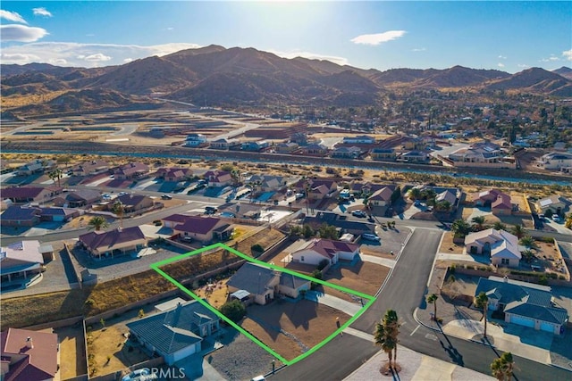 drone / aerial view featuring a mountain view