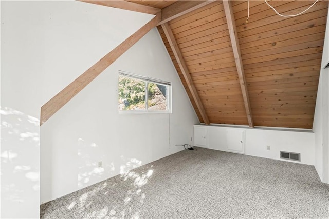 bonus room featuring lofted ceiling with beams, visible vents, carpet floors, and wood ceiling