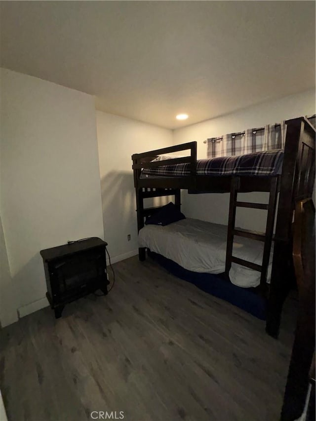 bedroom featuring wood-type flooring