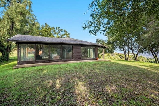 exterior space featuring a sunroom