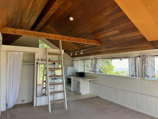 interior space with wood ceiling, carpet, track lighting, lofted ceiling, and white refrigerator