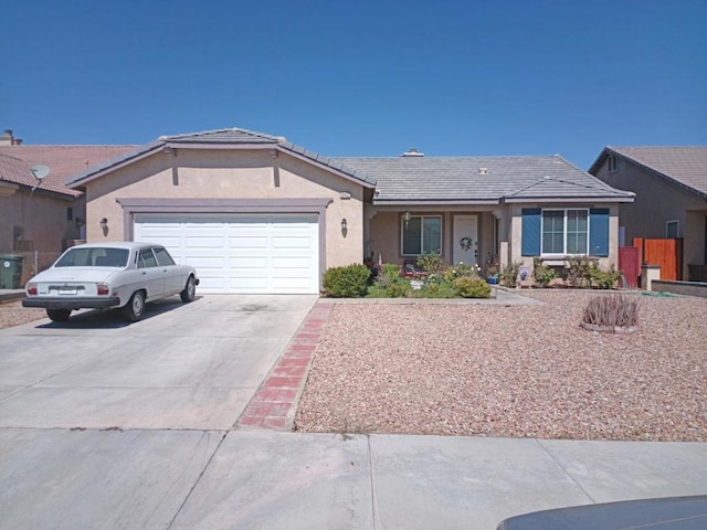 ranch-style house featuring a garage