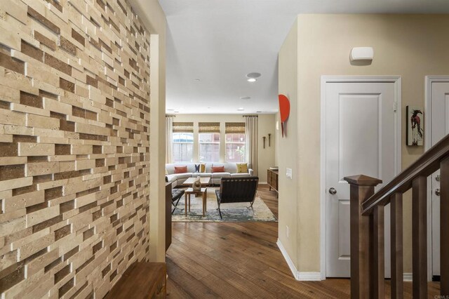 hallway featuring wood-type flooring