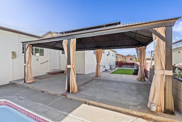 view of car parking with a gazebo