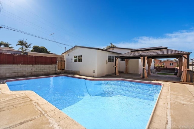 view of pool featuring a gazebo and a patio area