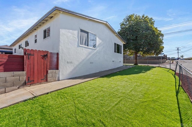 exterior space with a lawn