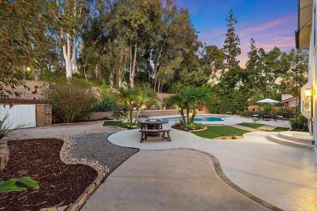 exterior space featuring a pool and a patio area