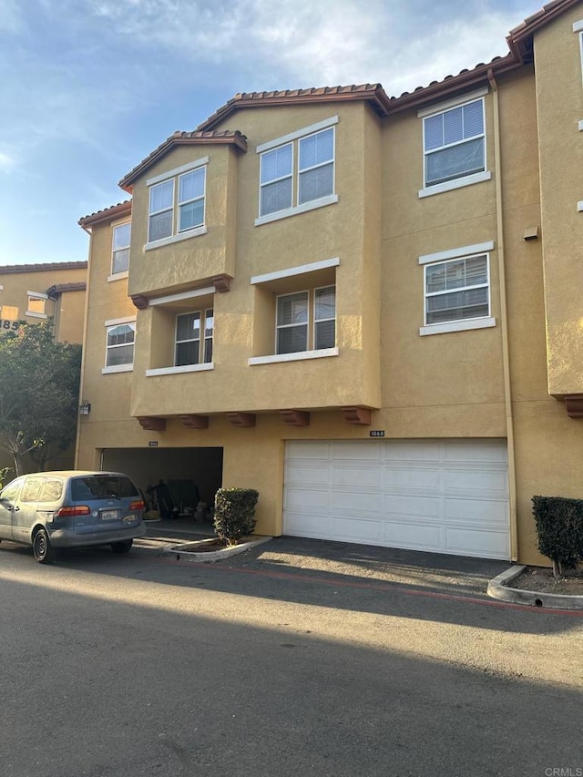 view of front of property with a garage