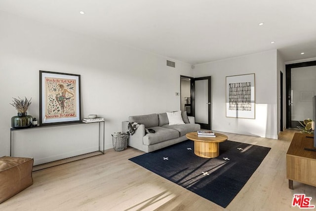 living room featuring light hardwood / wood-style floors