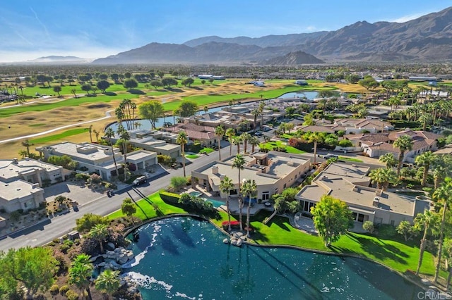 birds eye view of property with a residential view, golf course view, and a water and mountain view