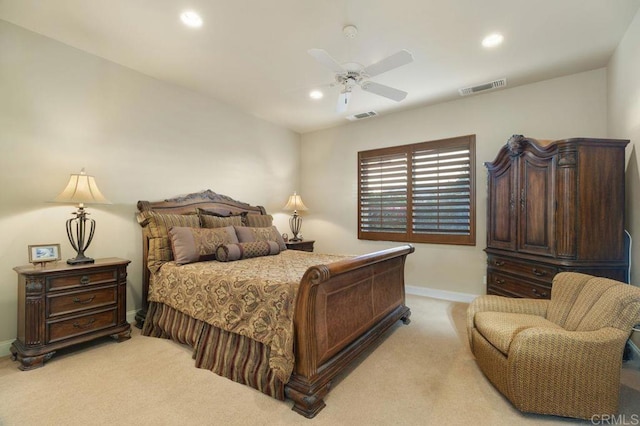 bedroom with recessed lighting, visible vents, and light carpet