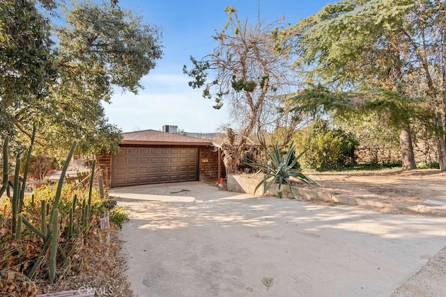 exterior space featuring a garage