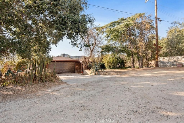 exterior space with a garage