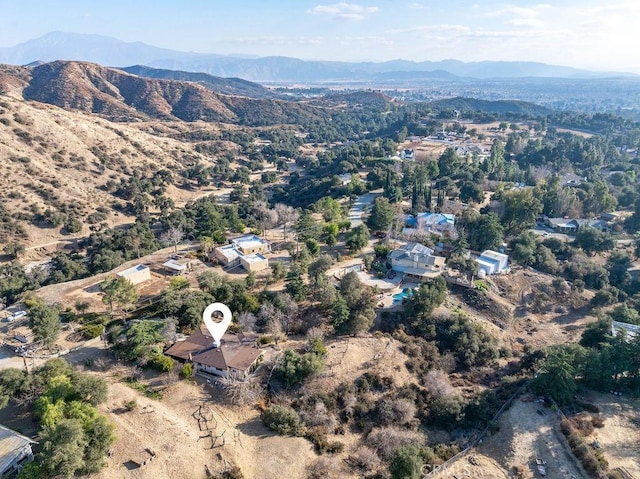 drone / aerial view featuring a mountain view