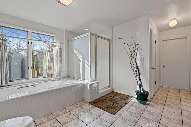 bathroom with independent shower and bath