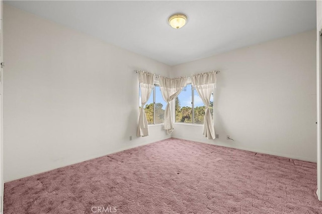 unfurnished room featuring carpet floors