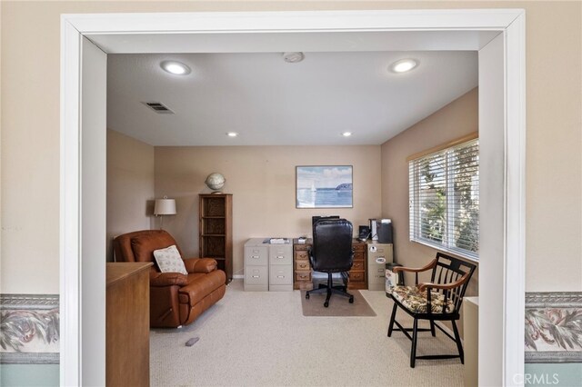 carpeted office featuring visible vents and recessed lighting