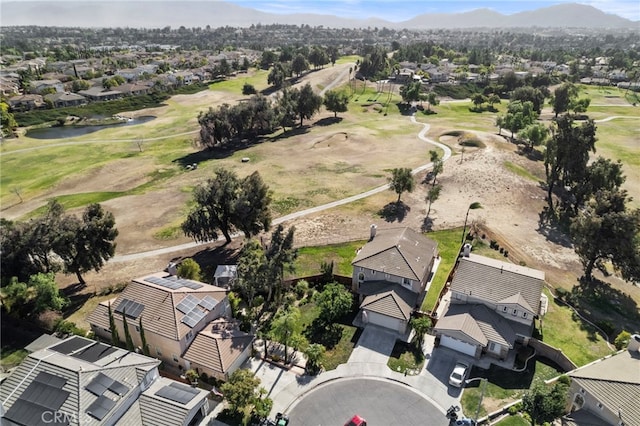 birds eye view of property with a residential view, view of golf course, and a water view