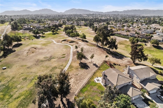 drone / aerial view with a residential view and a mountain view