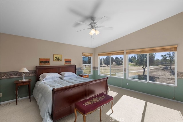 bedroom featuring lofted ceiling, carpet, a ceiling fan, and baseboards