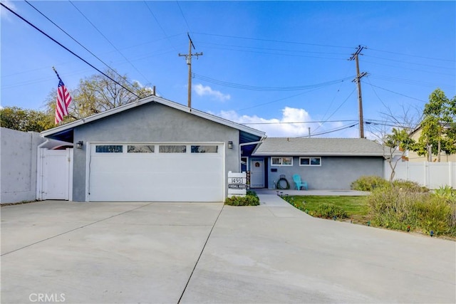 ranch-style home with a garage