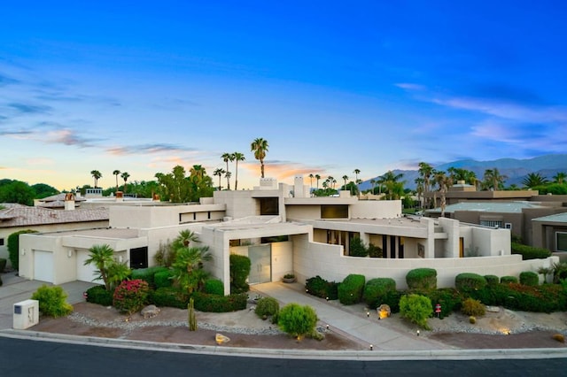 view of front facade featuring a mountain view