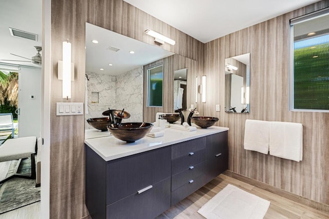 bathroom featuring hardwood / wood-style flooring and vanity