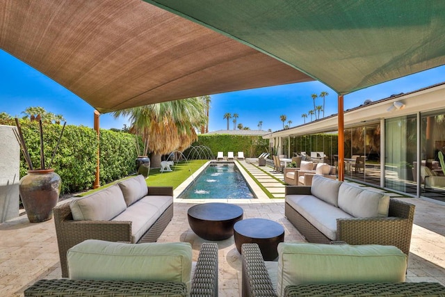 exterior space featuring pool water feature, a patio area, and outdoor lounge area